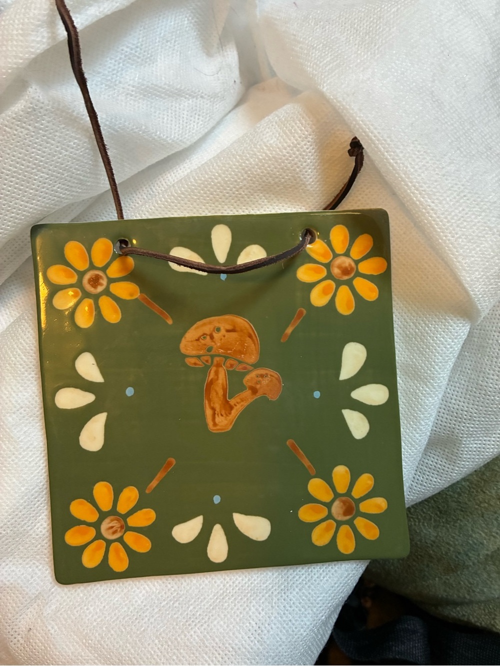 Green Ceramic Mushroom Wall Plaque with Yellow Flower Accents